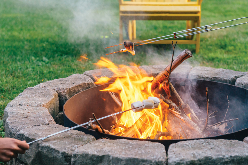 outdoor fire pit with marshmallows roasting